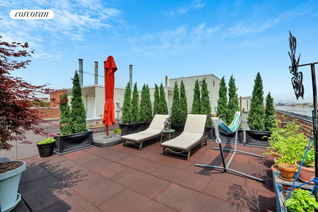 a view of a lounge chairs in patio