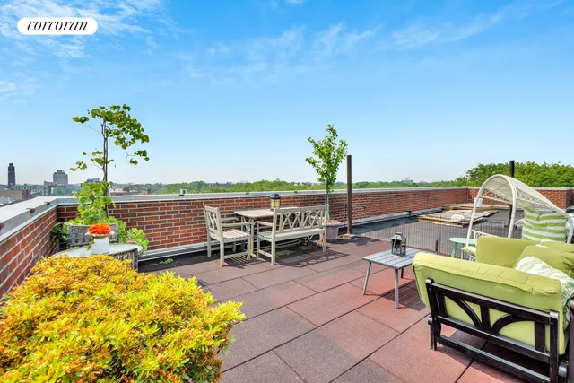 a view of a swimming pool with chairs