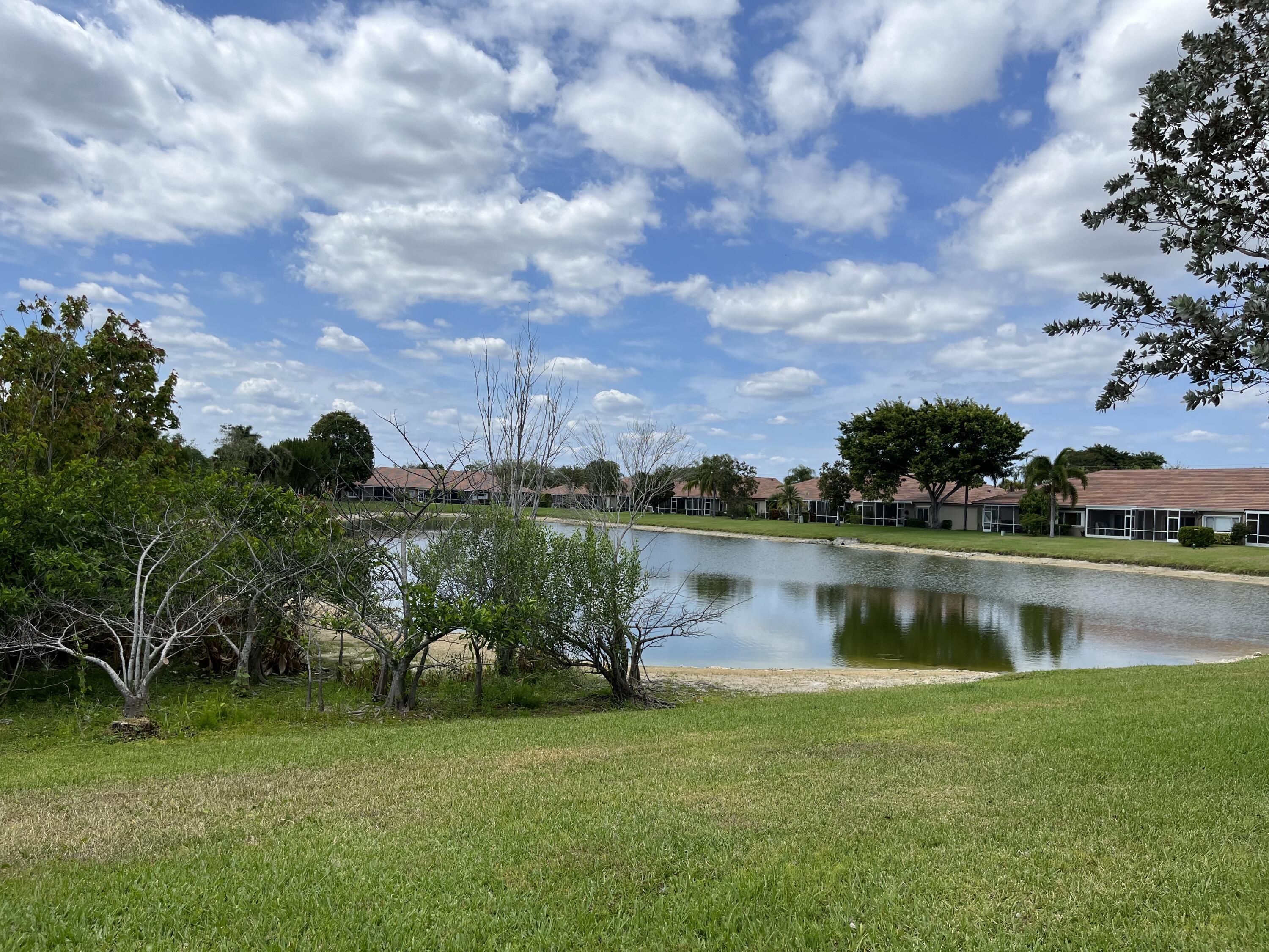 21105 Vía Solano Boca Raton, FL 33433 - Photo 2 of 14 a view of a lake