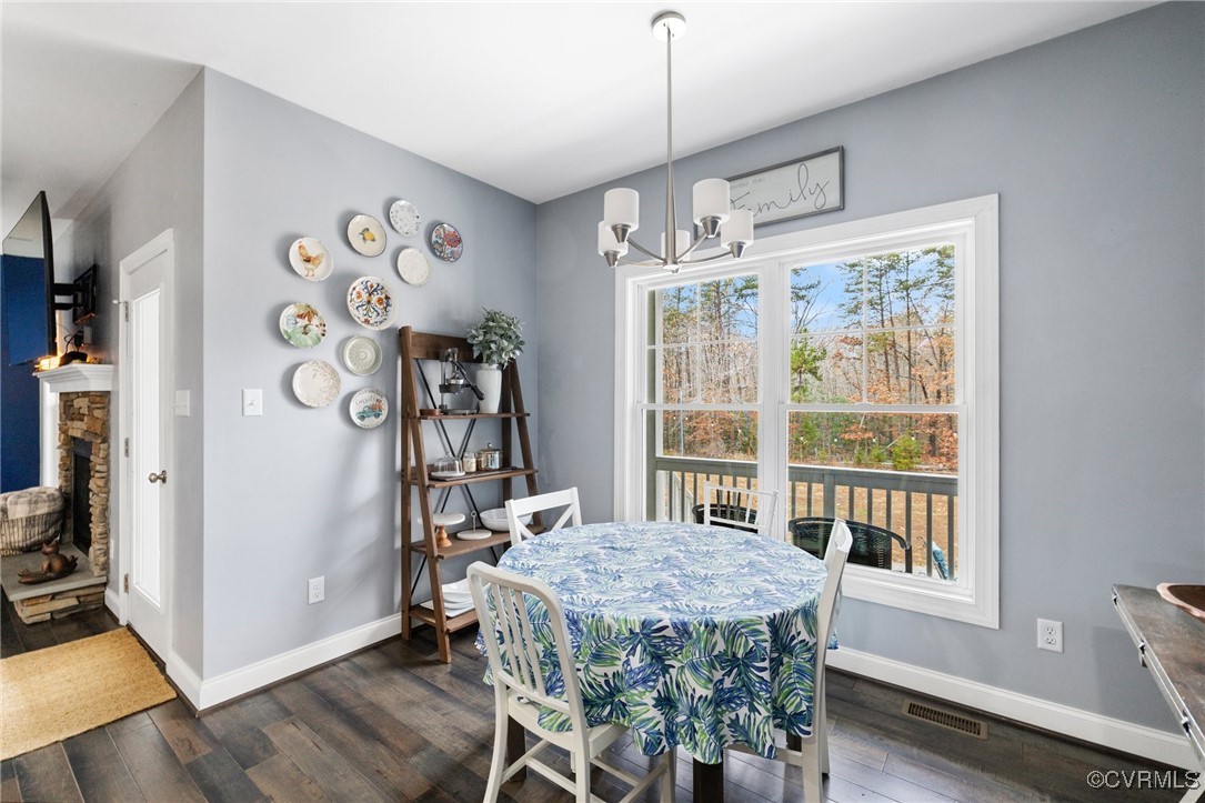 2802 Perkinsville Road Maidens, VA 23102 - Photo 15 of 40 a view of a dining room with furniture window and wooden floor