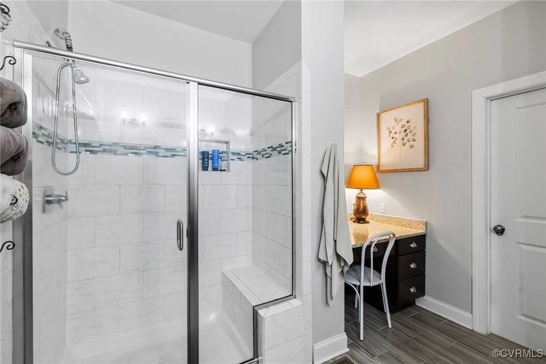 2802 Perkinsville Road Maidens, VA 23102 - Photo 26 of 40 a bathroom with a shower and a table