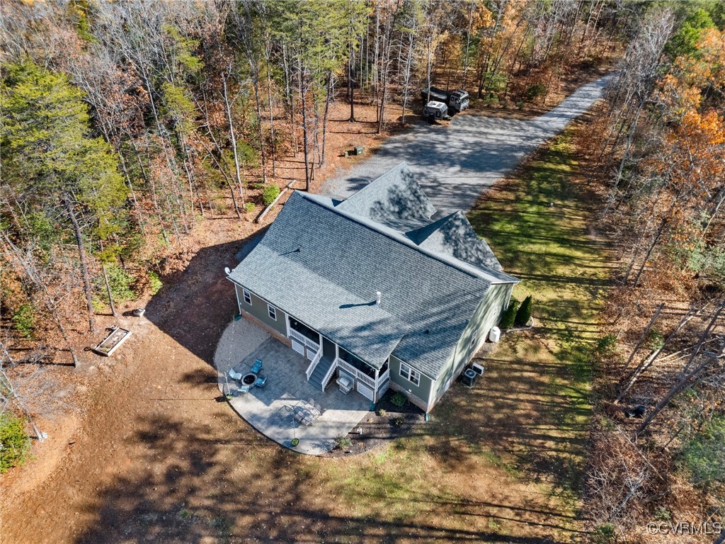 2802 Perkinsville Road Maidens, VA 23102 - Photo 39 of 40 a view of roof deck with wooden fence and a bench