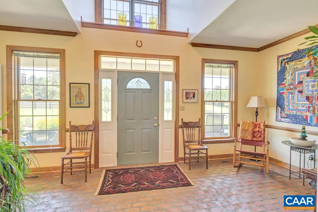 846 Troy Road Troy, VA 22974 - Photo 23 of 49 a living room with furniture and a window