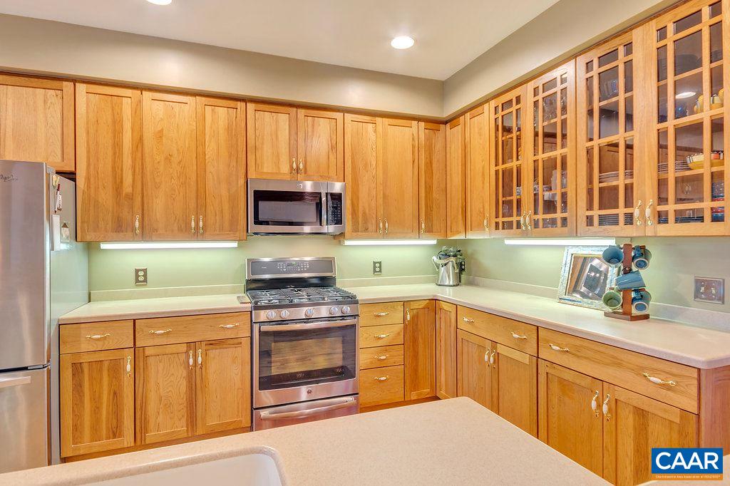 846 Troy Road Troy, VA 22974 - Photo 32 of 49 a kitchen with granite countertop cabinets stainless steel appliances and a sink