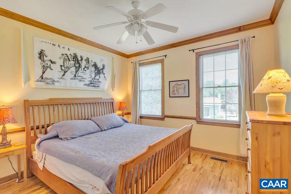 846 Troy Road Troy, VA 22974 - Photo 46 of 49 a bedroom with a bed and a window