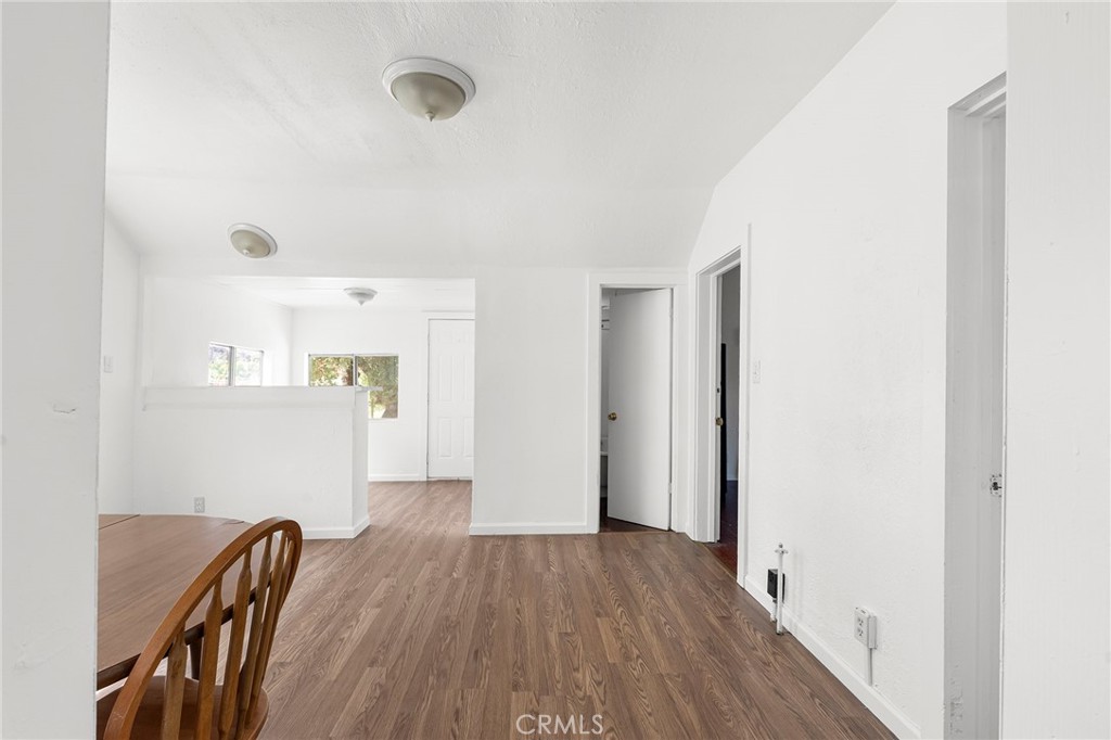 818 6th Street Corning, CA 96021 - Photo 12 of 32 a view of hallway with wooden floor
