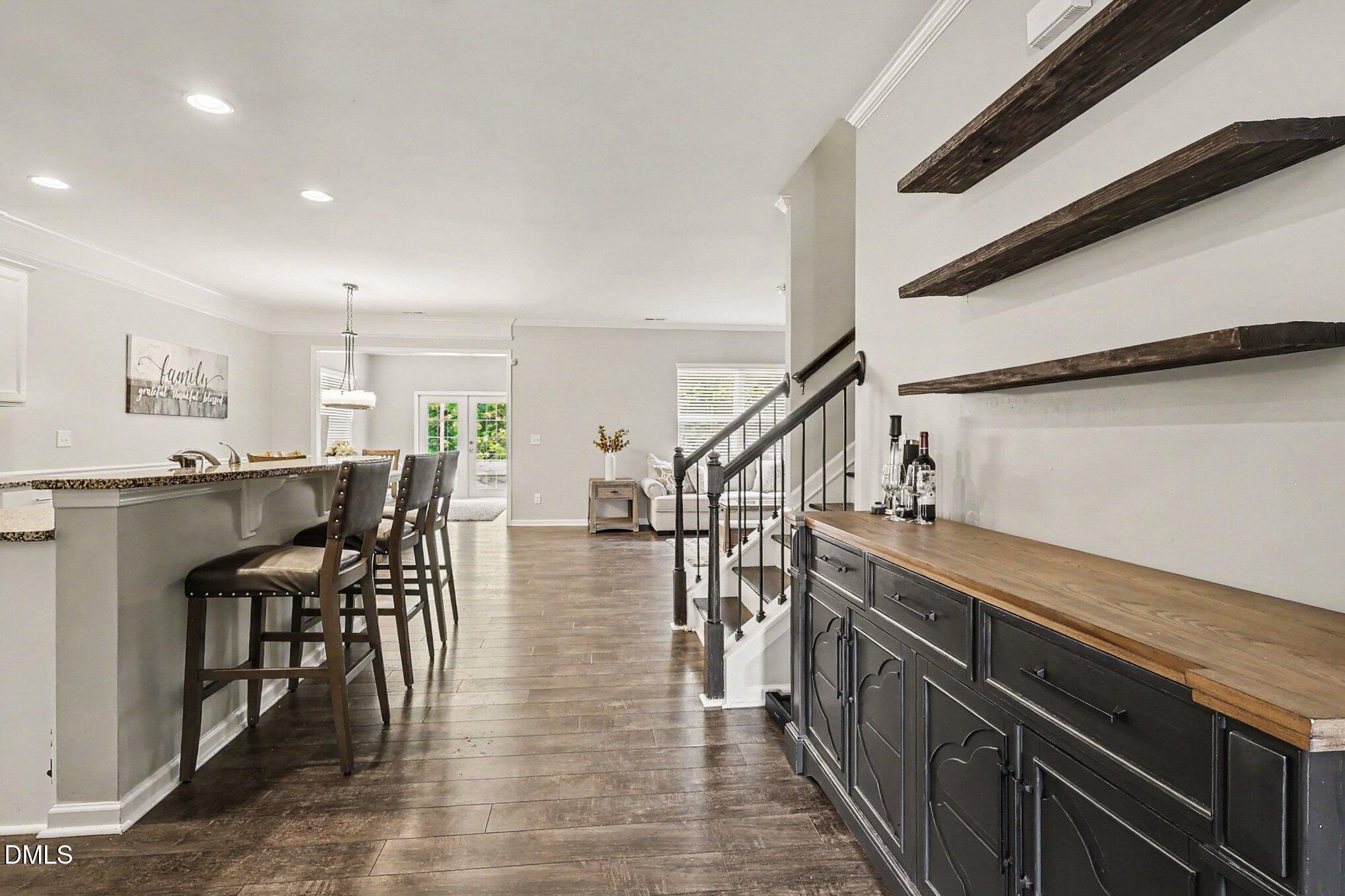 4366 Auburn Hills Drive Raleigh, NC 27616 - Photo 11 of 40 a view of kitchen and dining room with furniture