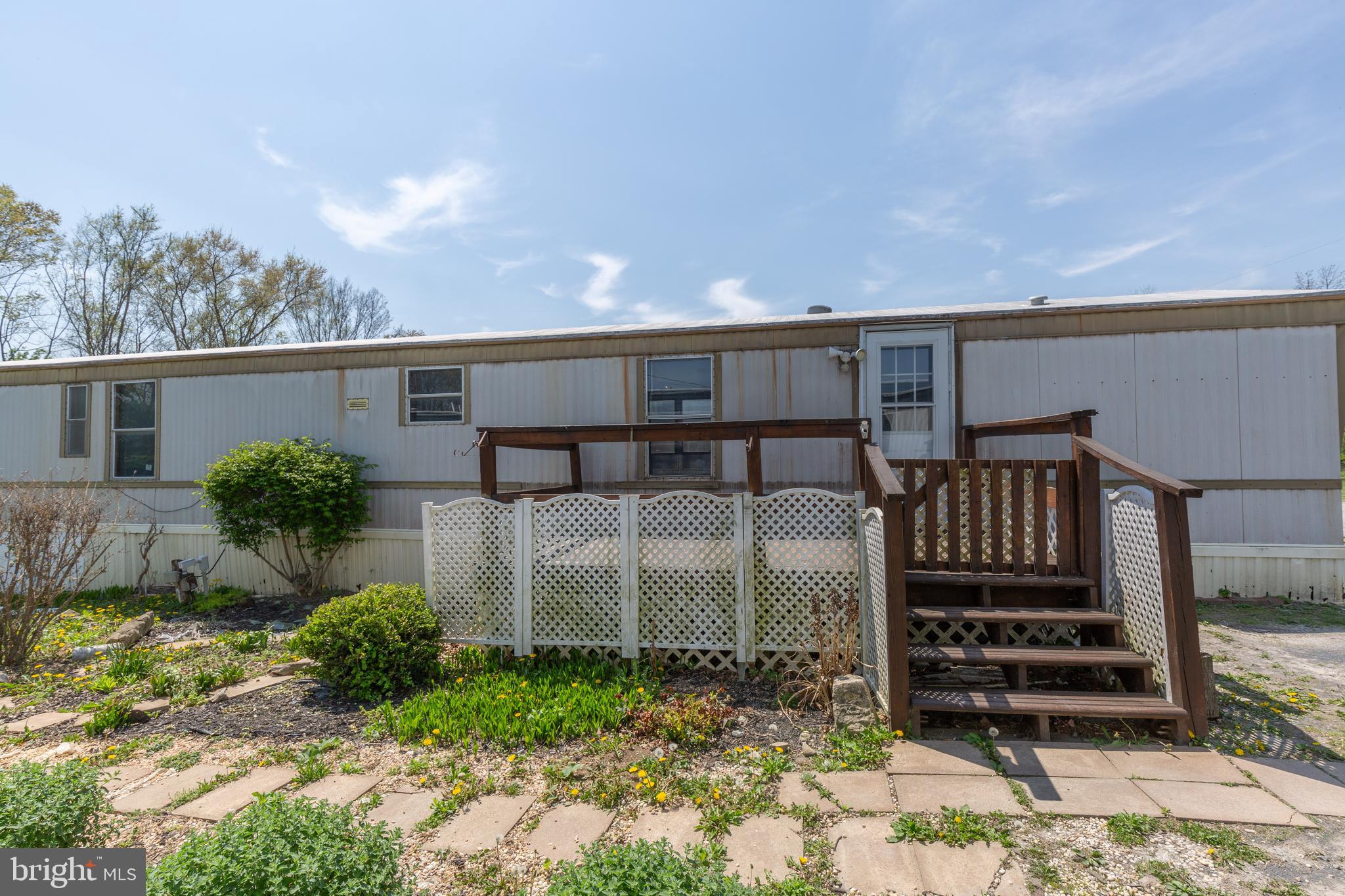 90 Fabric Drive Bunker Hill, WV 25413 - Photo 2 of 28 a front view of a house