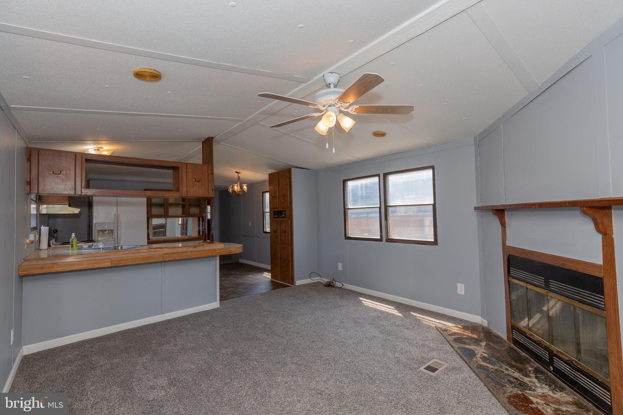 90 Fabric Drive Bunker Hill, WV 25413 - Photo 24 of 28 a view of kitchen with sink and microwave