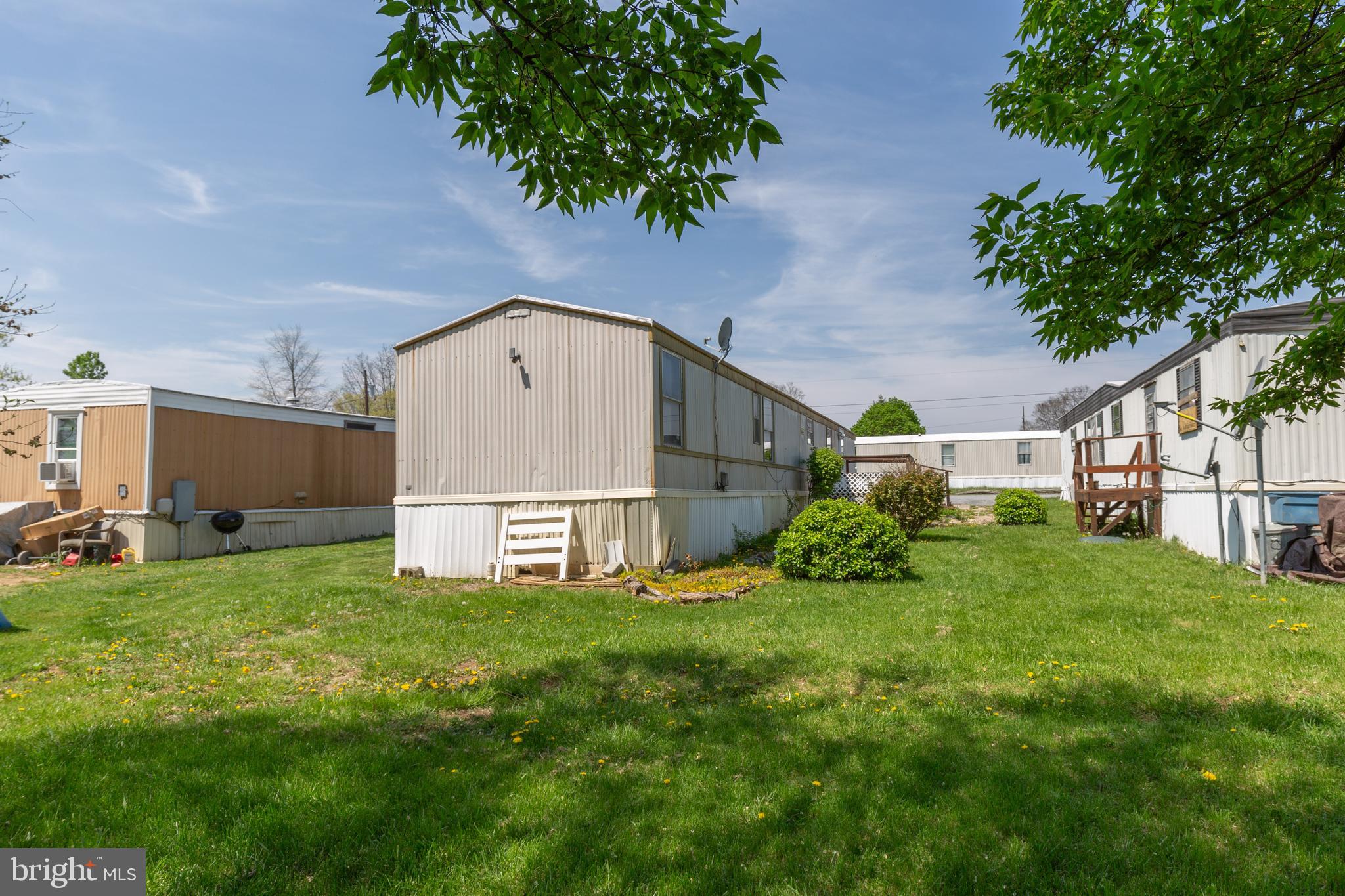 90 Fabric Drive Bunker Hill, WV 25413 - Photo 5 of 28 a view of a house with backyard