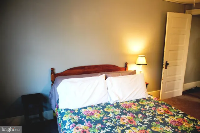 a view of a door and a window