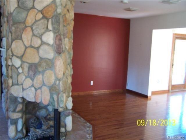 1350 Ellis Road Ypsilanti, MI 48197 - Photo 6 of 12 fireplace-formal dining room.JPG
