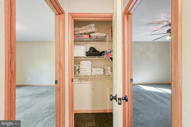 a view of a bedroom with closet