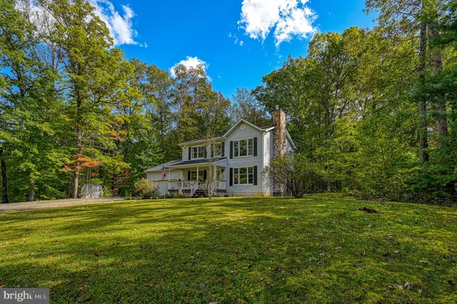 a view of a house with a big yard