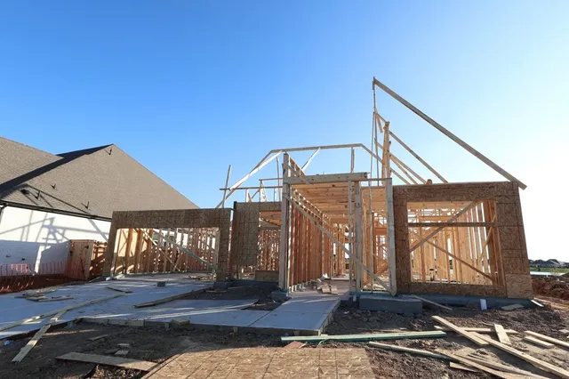 a view of a house with a street