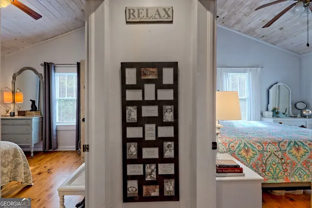 a bedroom with bed and a dresser
