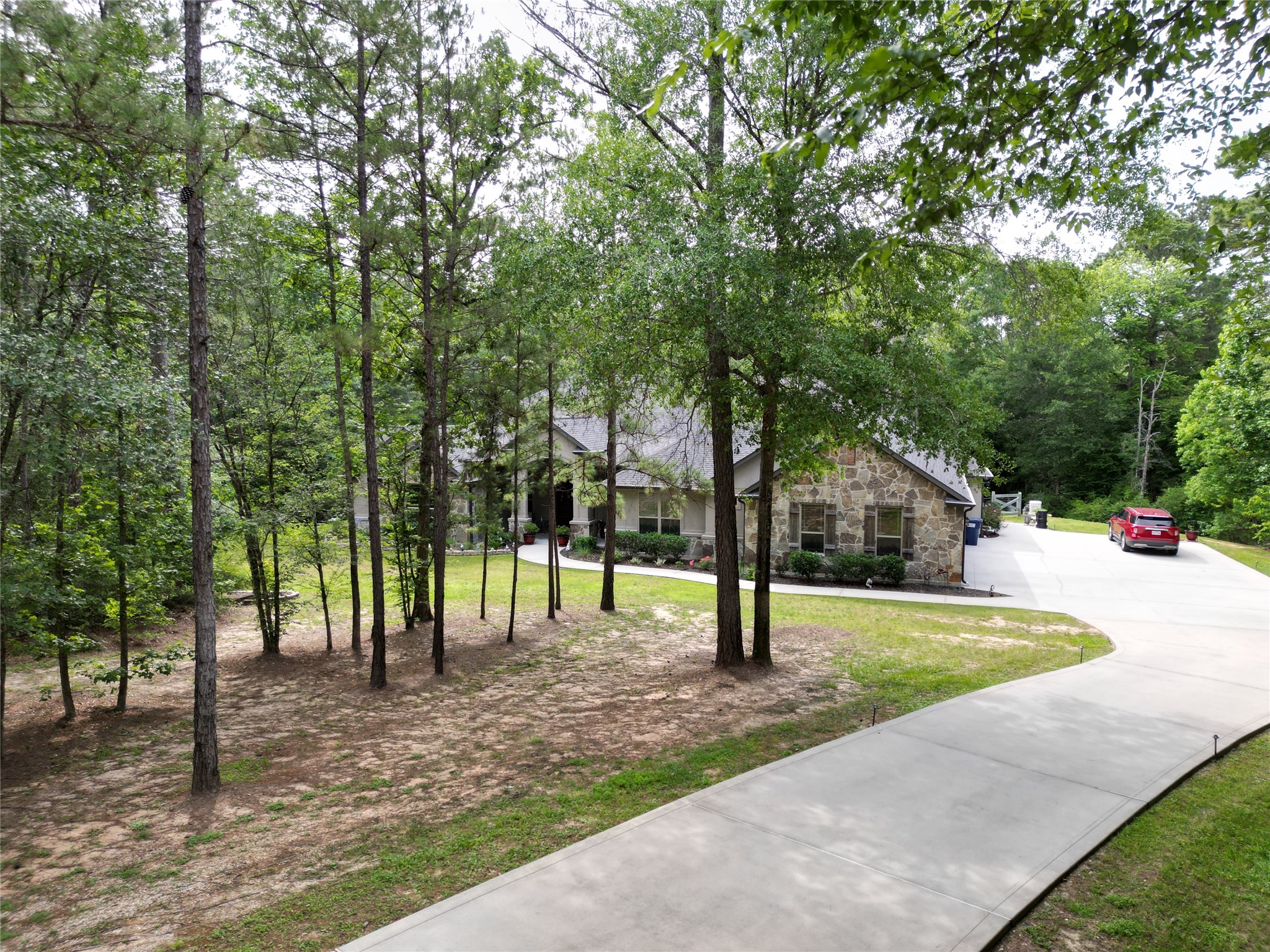121 Red Hawk Road Huntsville, TX 77340 - Photo 3 of 48 Beautiful set back from road