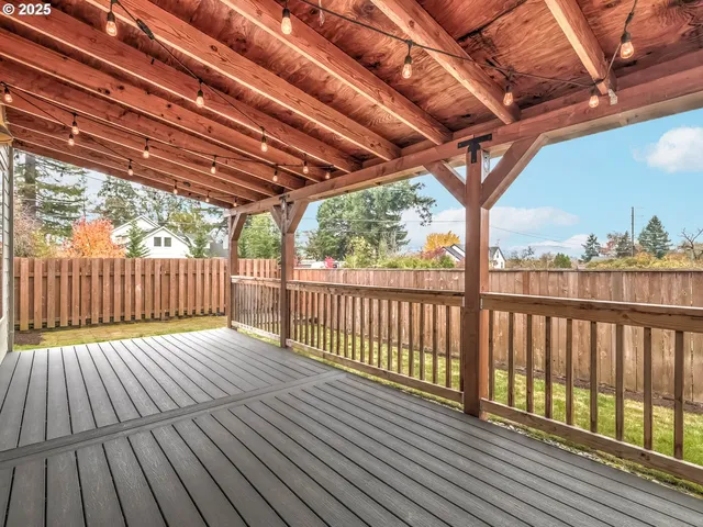 a view of porch with wooden floor