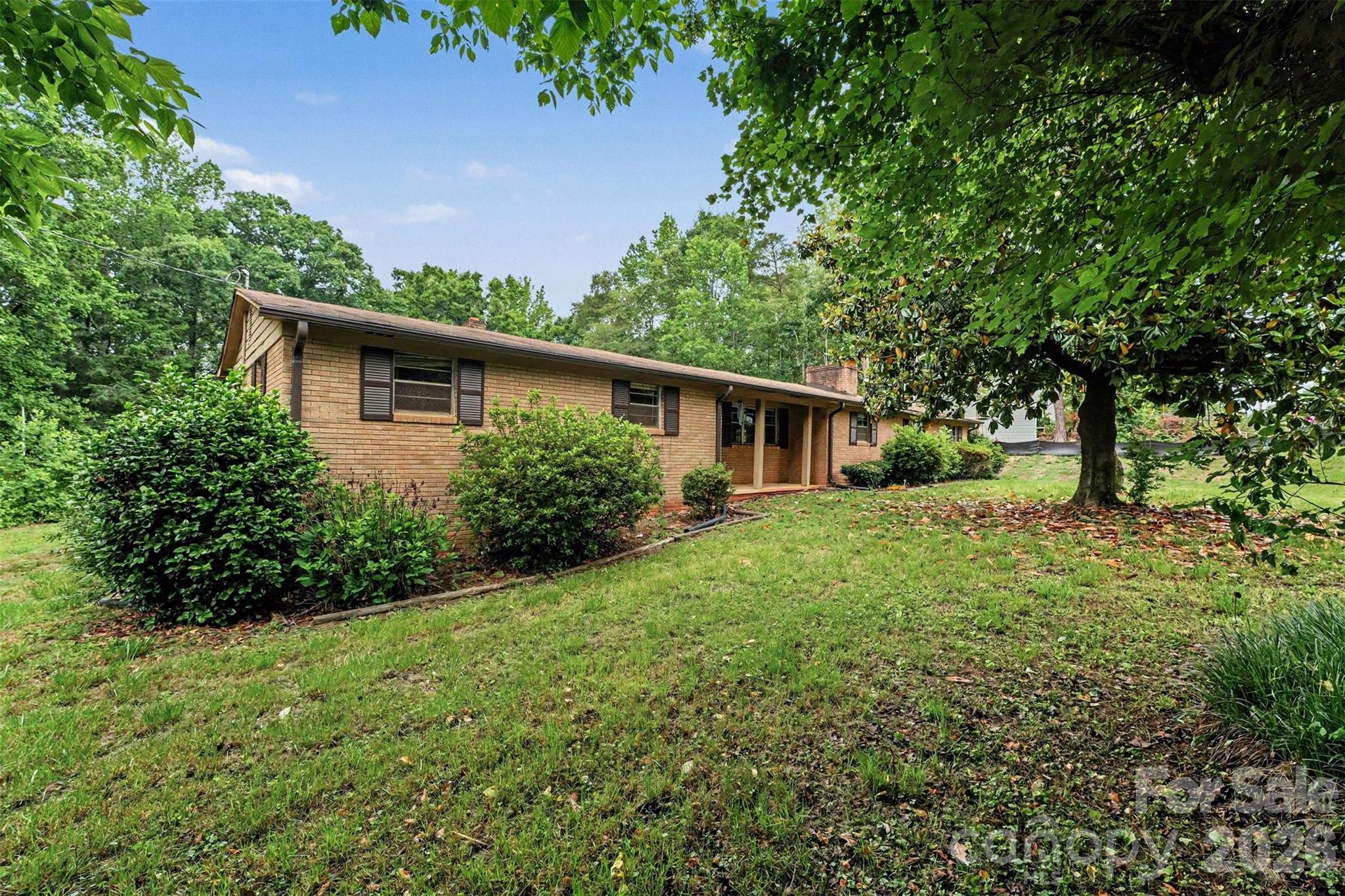 2871 Loviee Road Lincolnton, NC 28092 - Photo 14 of 14 a house view with a garden space