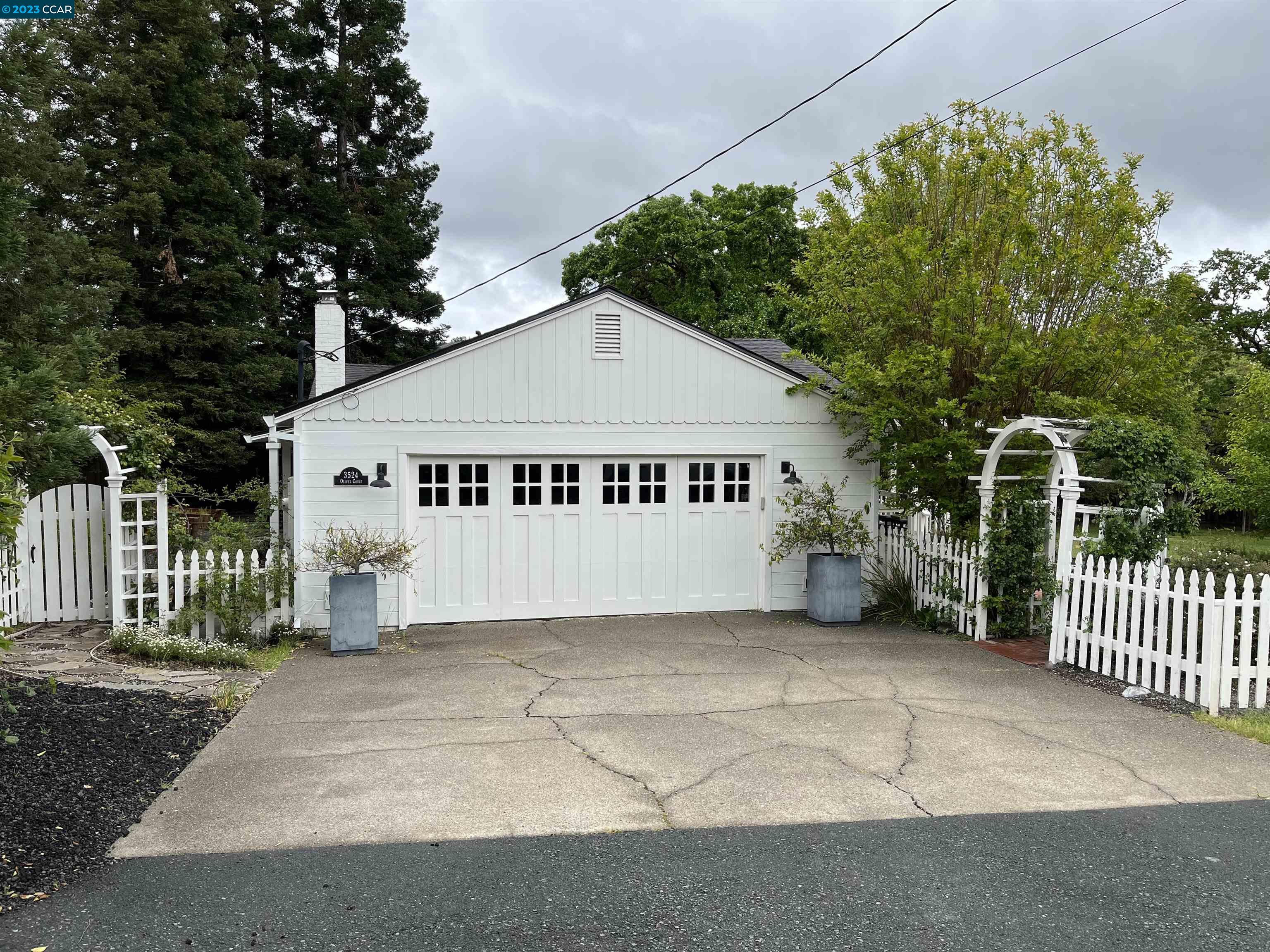 3524 Oliver Court Lafayette, CA 94549 - Photo 2 of 32 a view of a house with a yard and fence