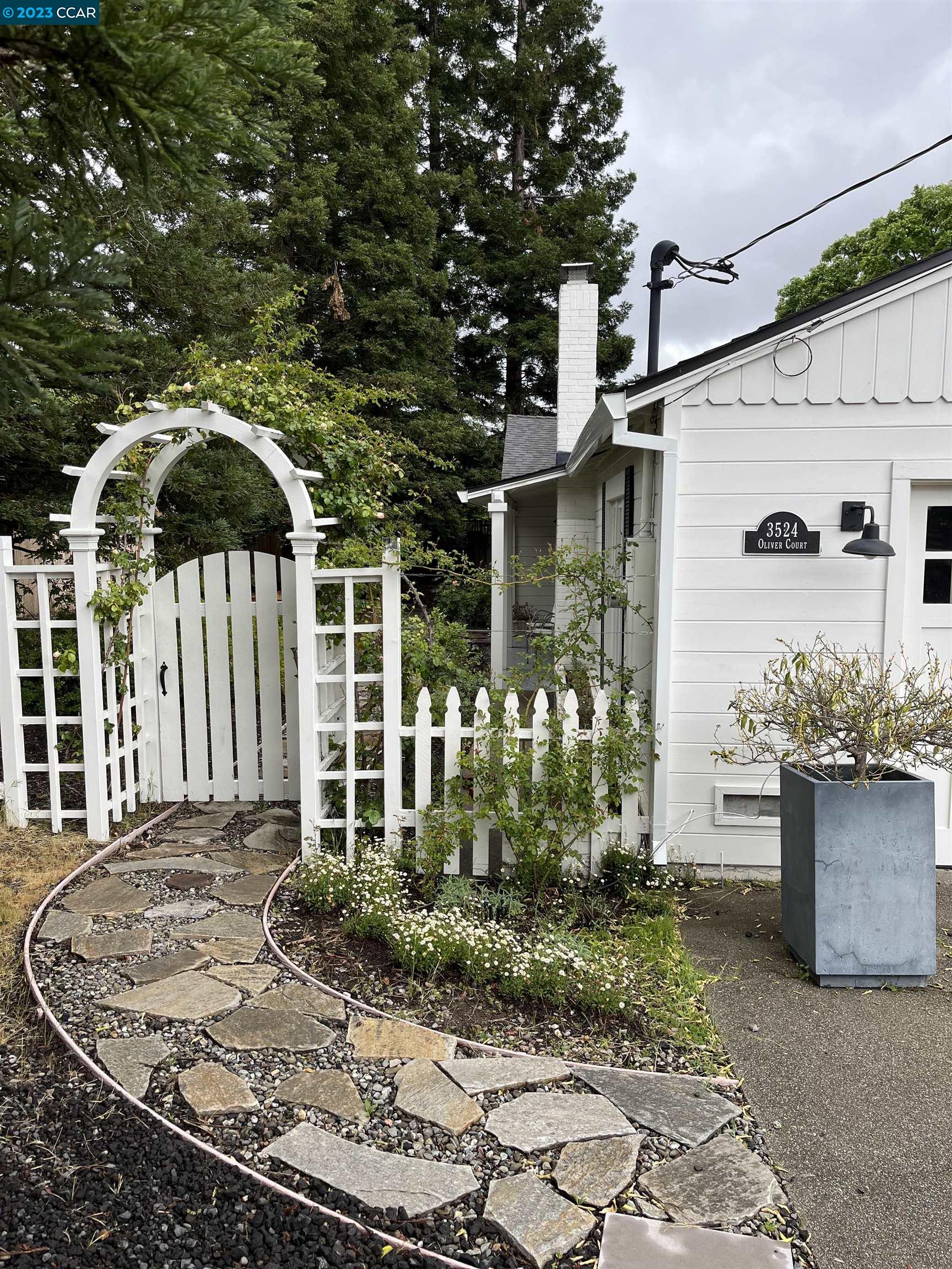 3524 Oliver Court Lafayette, CA 94549 - Photo 27 of 32 a front view of a house with garden
