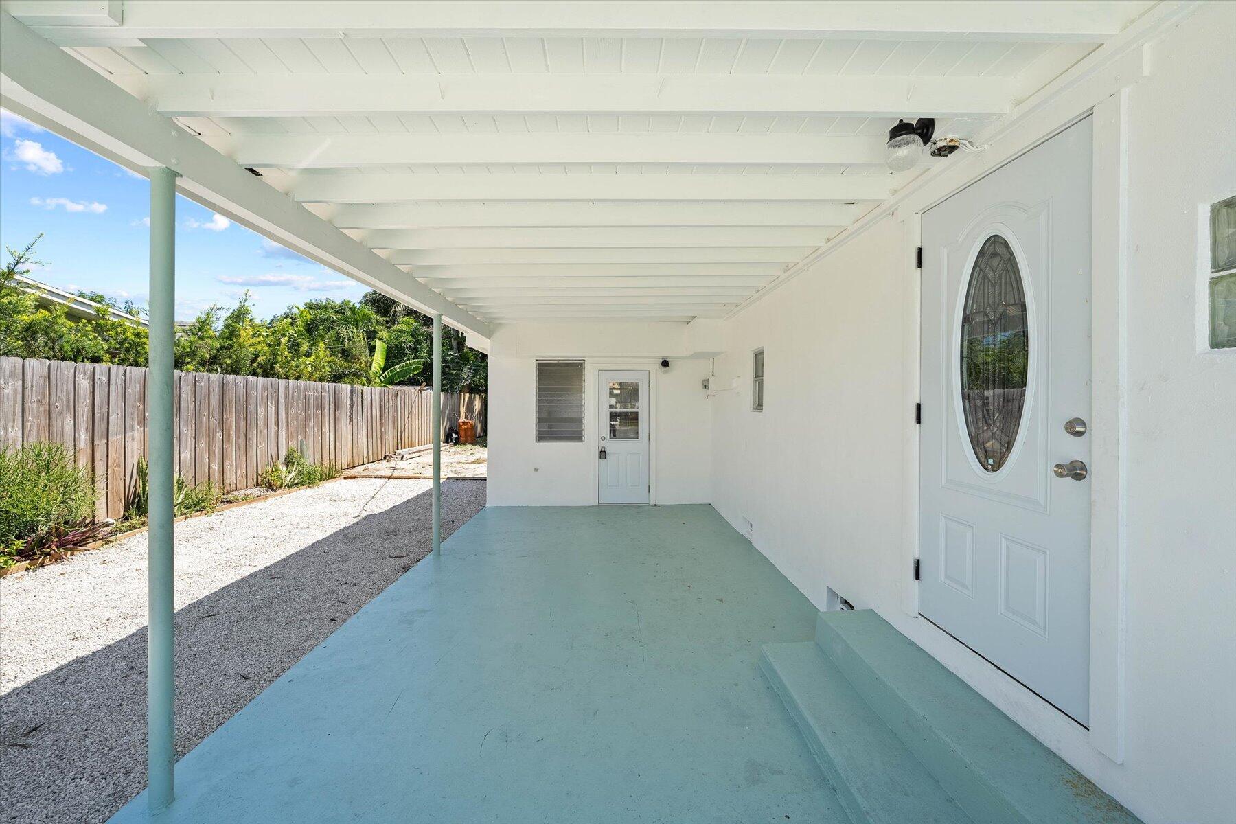 7936 Terrace Road Lantana, FL 33462 - Photo 4 of 25 a view of a porch