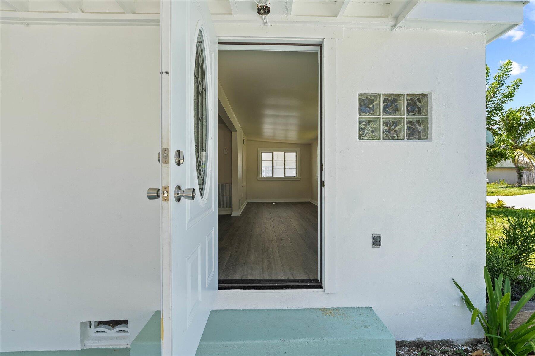 7936 Terrace Road Lantana, FL 33462 - Photo 5 of 25 a view of an front door