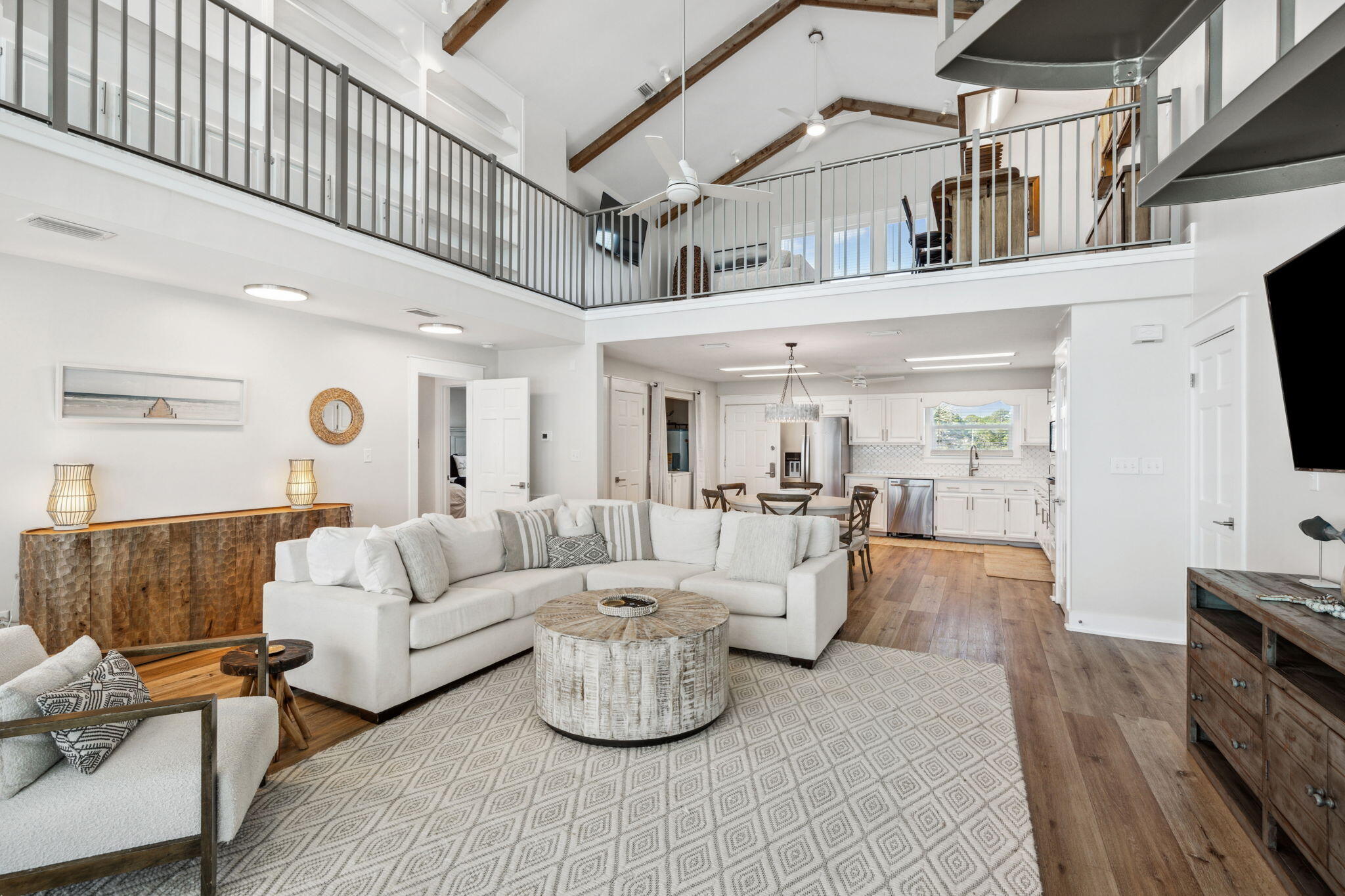 103 Fort Panic Road Santa Rosa Beach, FL 32459 - Photo 14 of 60 a living room with furniture and a flat screen tv