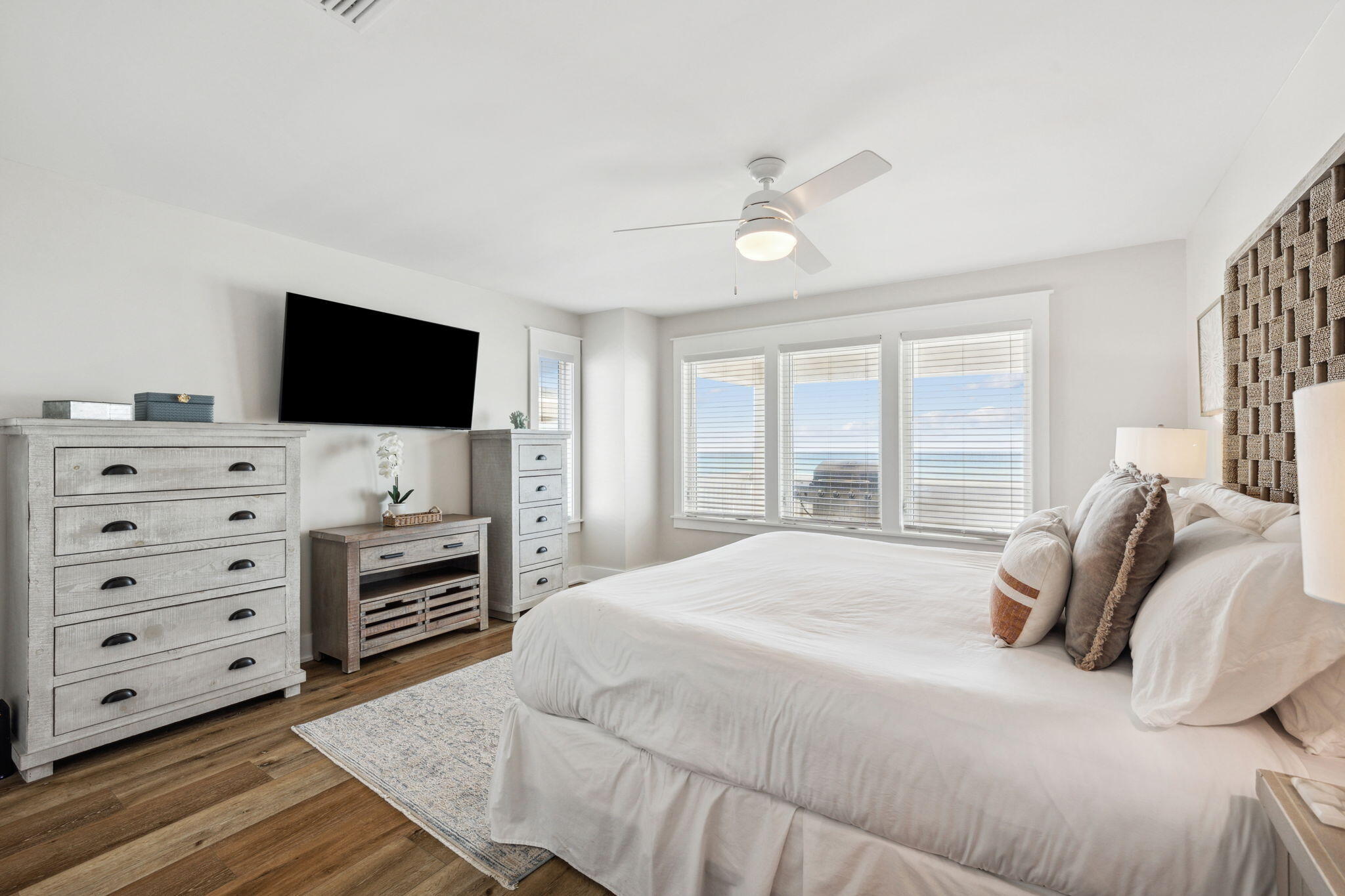 103 Fort Panic Road Santa Rosa Beach, FL 32459 - Photo 17 of 60 a bedroom with a bed and a flat screen tv