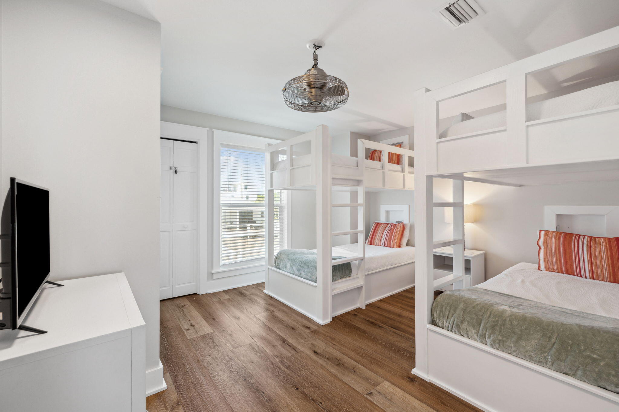 103 Fort Panic Road Santa Rosa Beach, FL 32459 - Photo 18 of 60 a bedroom with furniture and wooden floor