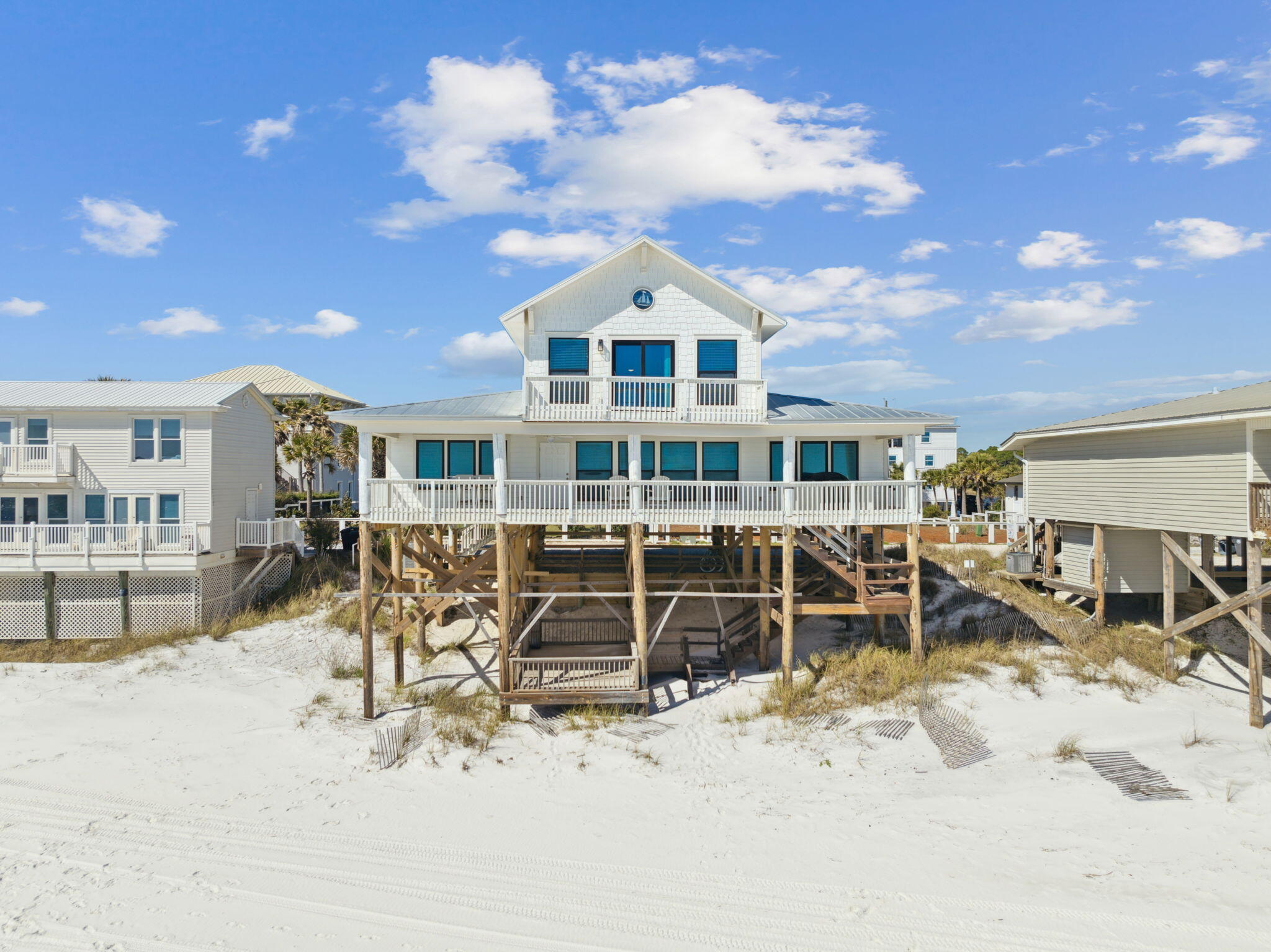103 Fort Panic Road Santa Rosa Beach, FL 32459 - Photo 36 of 60 an front view of a house with table and chairs