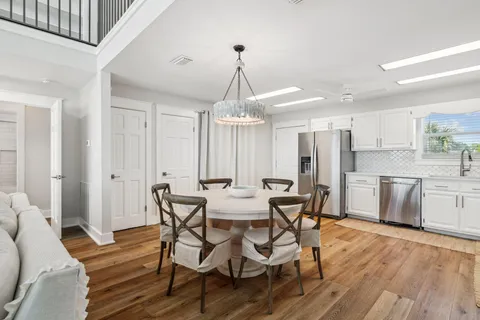 a bedroom with a bed and a flat screen tv in it