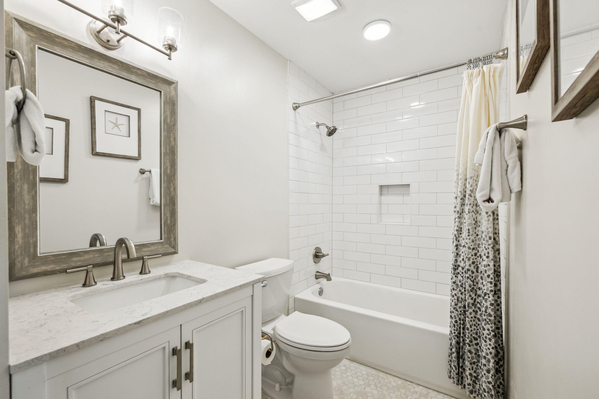 103 Fort Panic Road Santa Rosa Beach, FL 32459 - Photo 49 of 60 a bathroom with a sink a toilet and shower