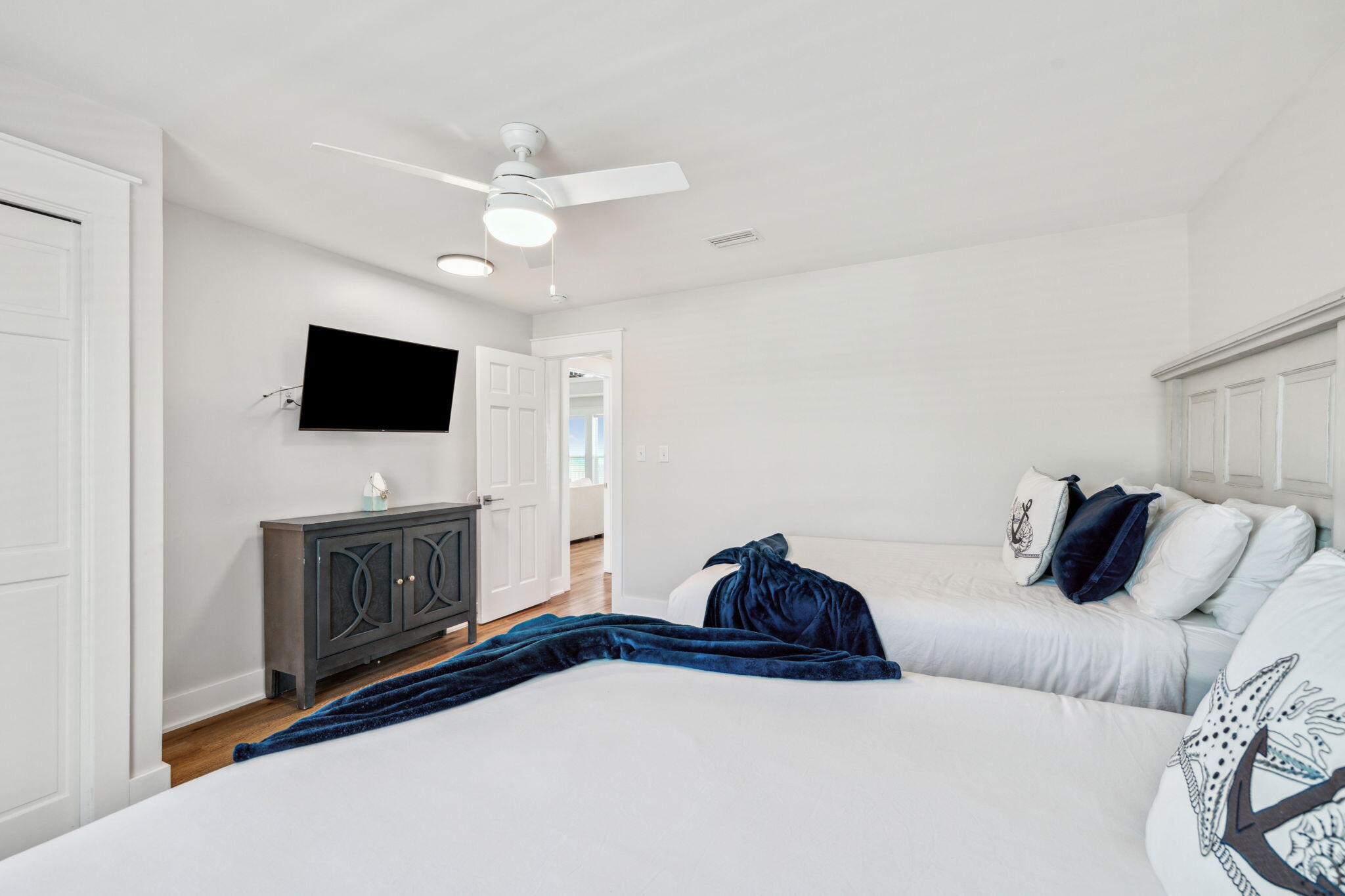 103 Fort Panic Road Santa Rosa Beach, FL 32459 - Photo 55 of 60 a living room with furniture and a flat screen tv