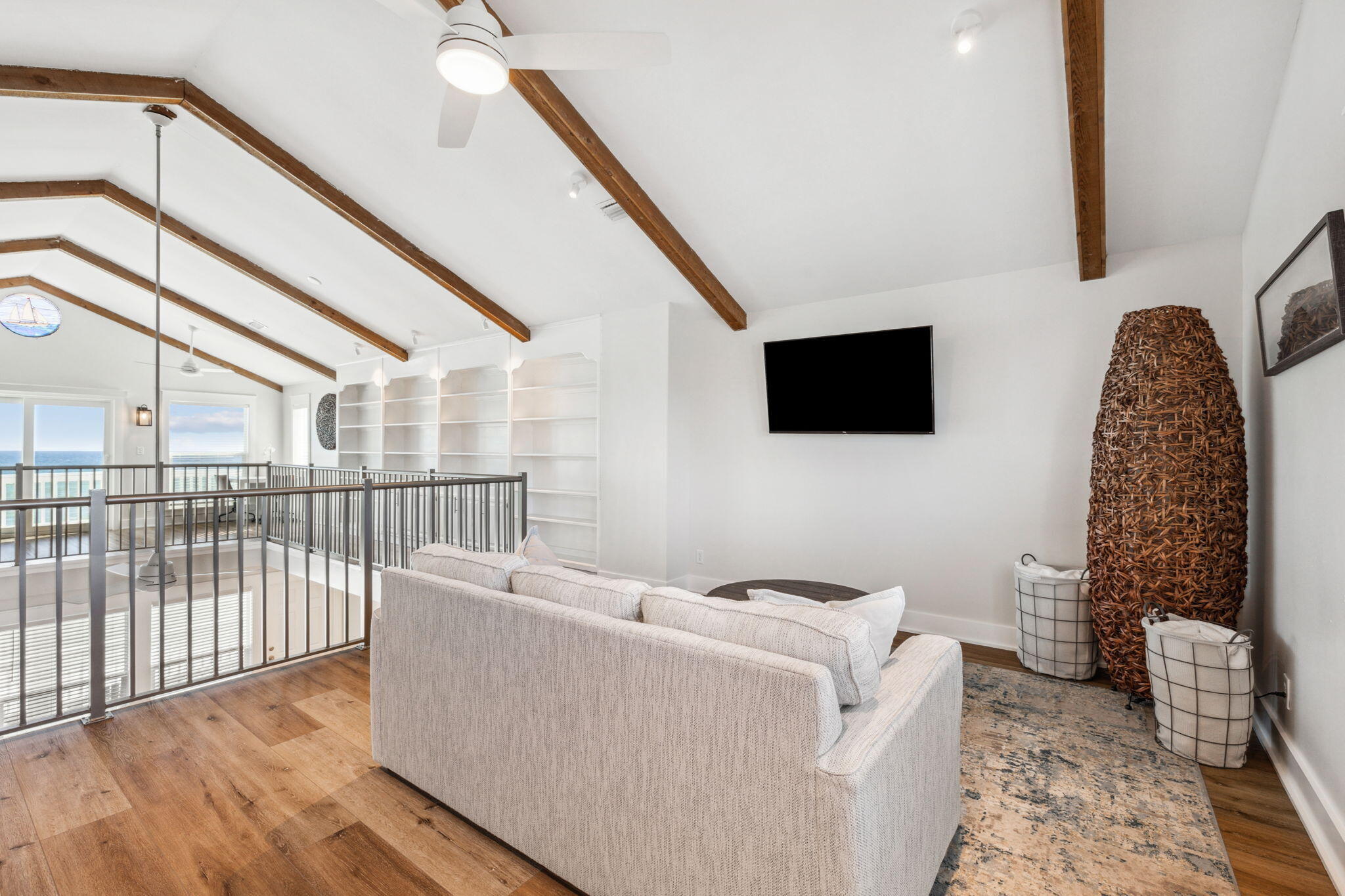 103 Fort Panic Road Santa Rosa Beach, FL 32459 - Photo 60 of 60 a living room with furniture and a flat screen tv