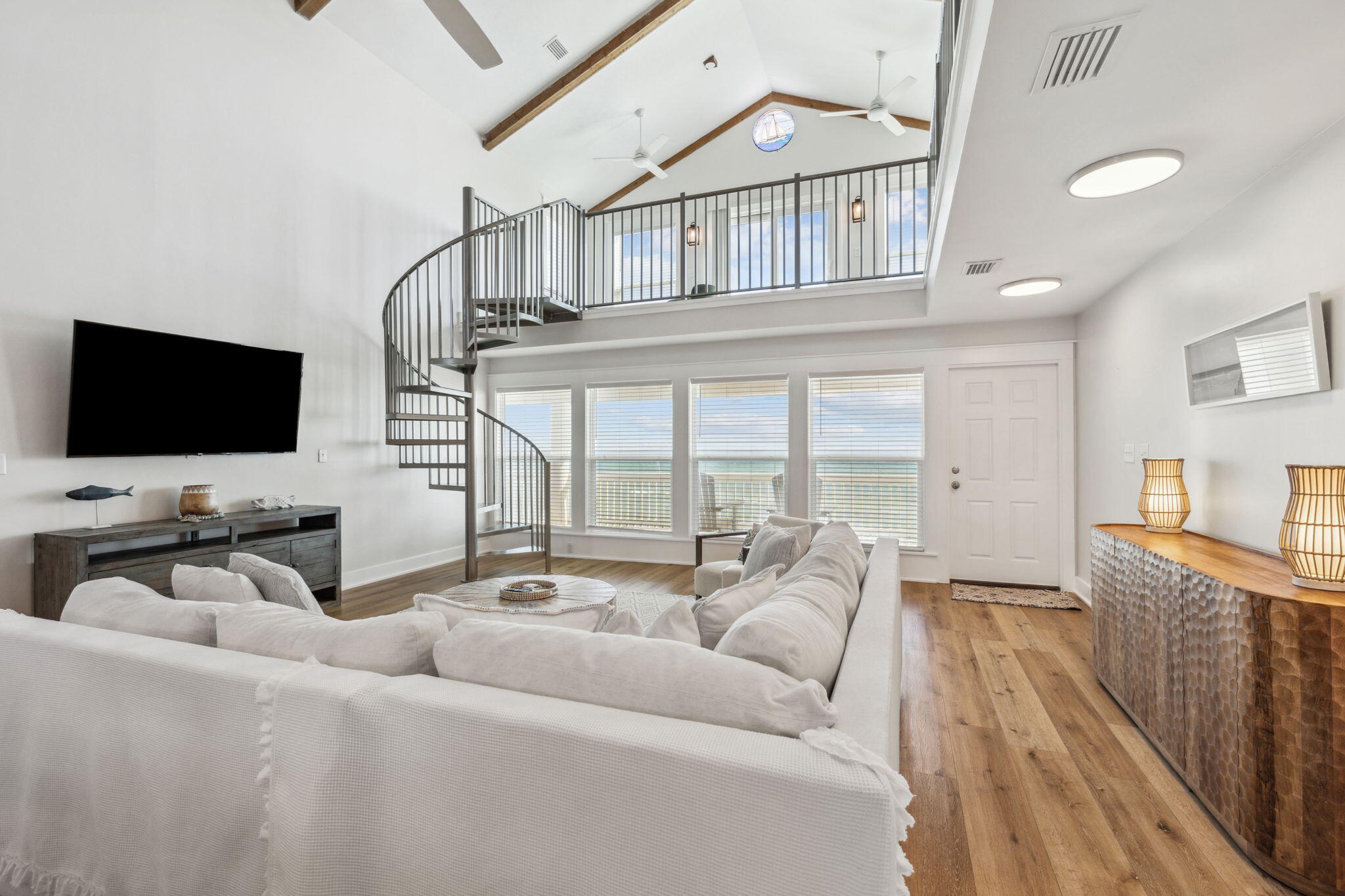 103 Fort Panic Road Santa Rosa Beach, FL 32459 - Photo 9 of 60 a living room with furniture and a flat screen tv