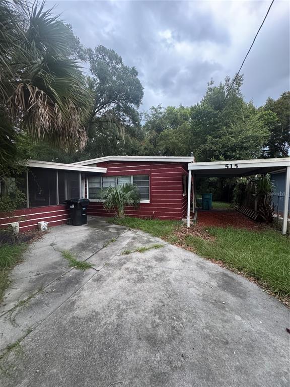 515 Sunset Drive Orlando, FL 32805 - Photo 1 of 1 a view of backyard with deck and outdoor seating