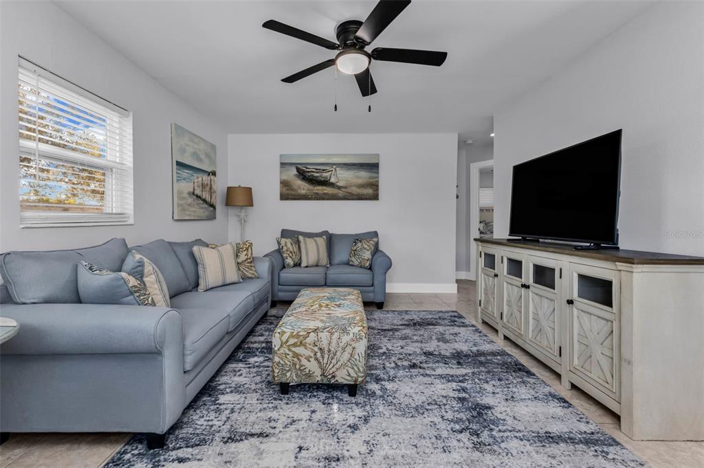 4319 Eaglet Road Punta Gorda, FL 33980 - Photo 4 of 22 a living room with furniture and a flat screen tv