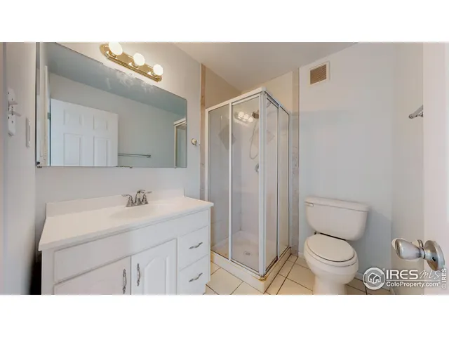 a bathroom with a sink a mirror and a vanity