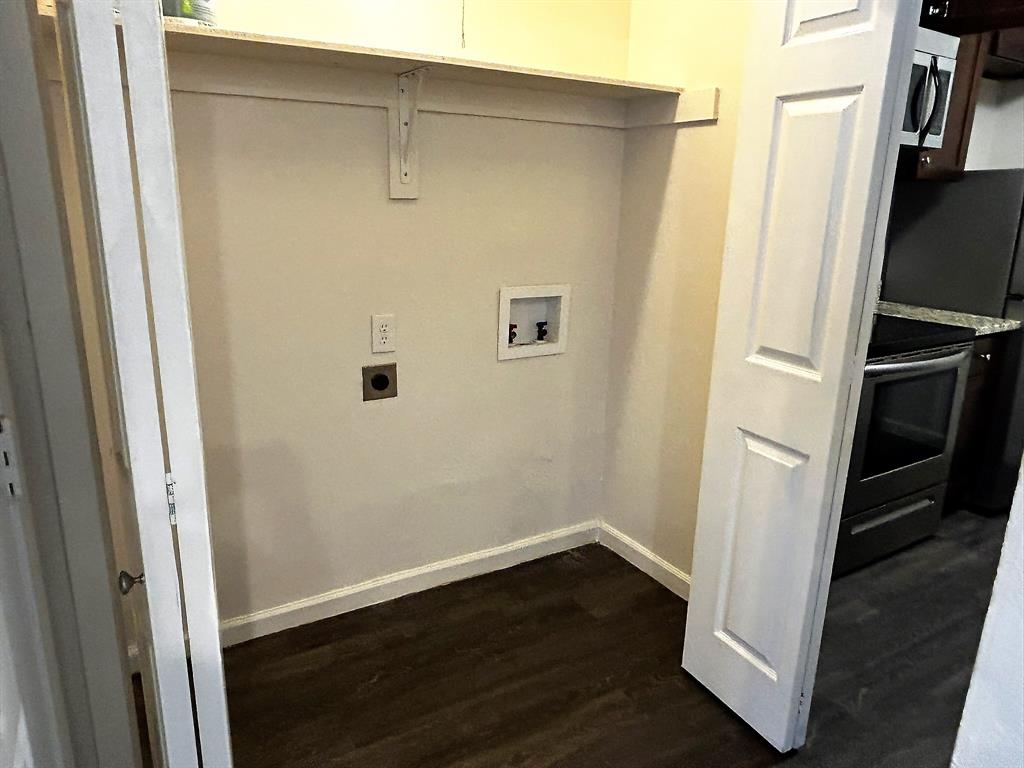 2200 East Trinity Mills Road, Unit 301 Carrollton, TX 75006 - Photo 16 of 16 a view of walk in closet with wooden floor