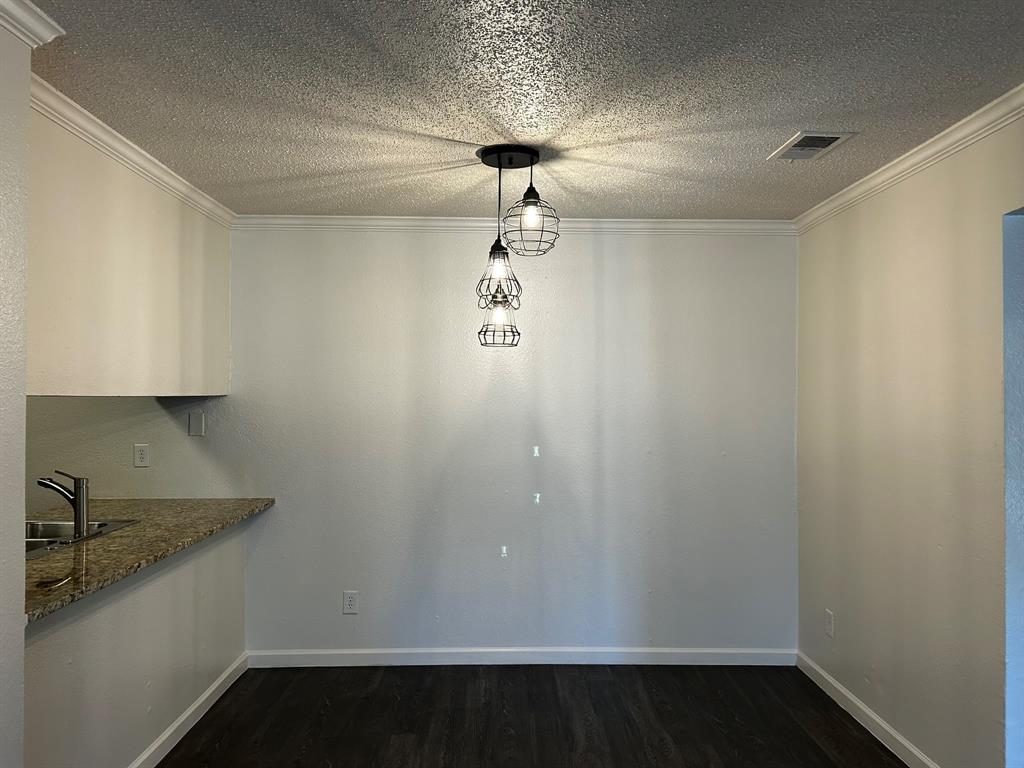 2200 East Trinity Mills Road, Unit 301 Carrollton, TX 75006 - Photo 6 of 16 a room with a walk in closet and window