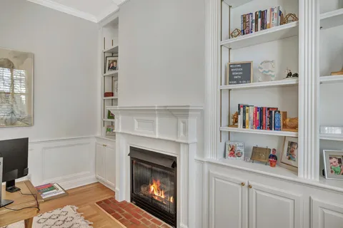 a view of entryway with wooden floor and stairs