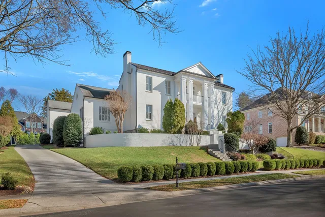 a view of staircase with white walls and stairs