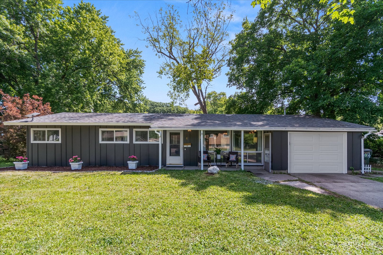 4 Woodcliff Road Montgomery, IL 60538 - Photo 14 of 18 front view of a house with a yard