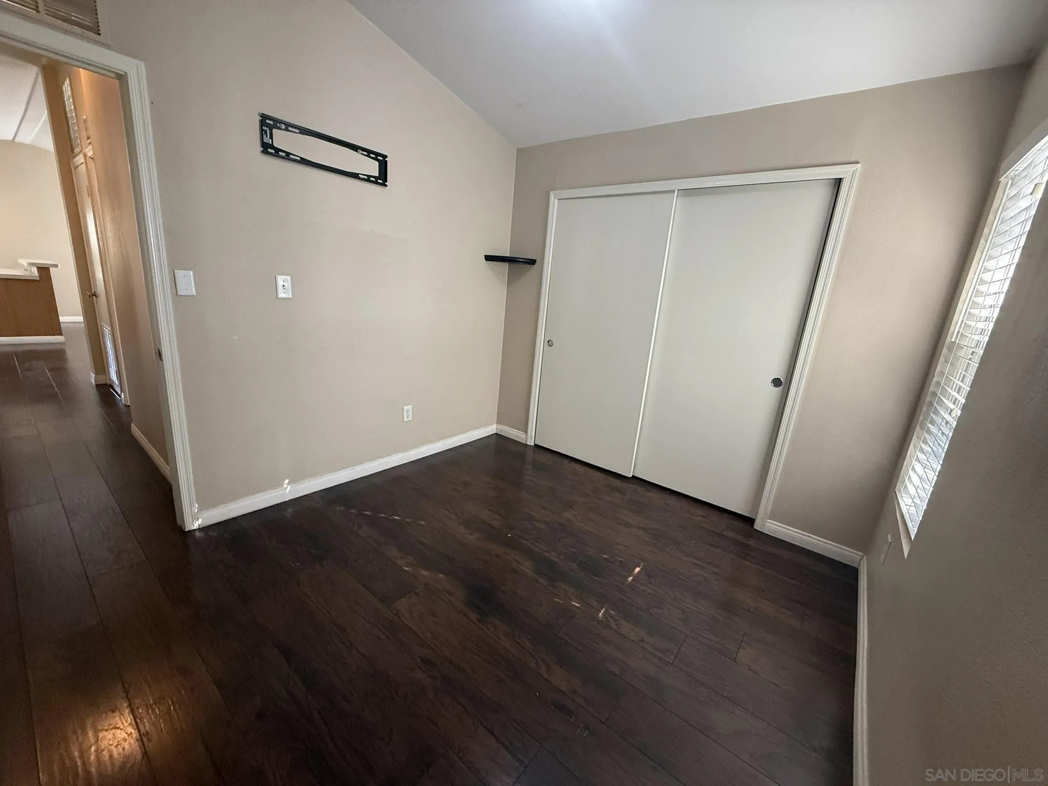 3505 Alpine Boulevard, Unit 49 Alpine, CA 91901 - Photo 19 of 31 a view of a hallway with wooden floor