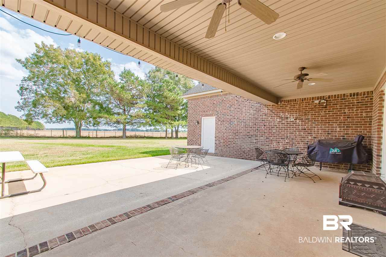 24204 Trowbridge Court Daphne, AL 36526 - Photo 32 of 36 Large Covered Porch