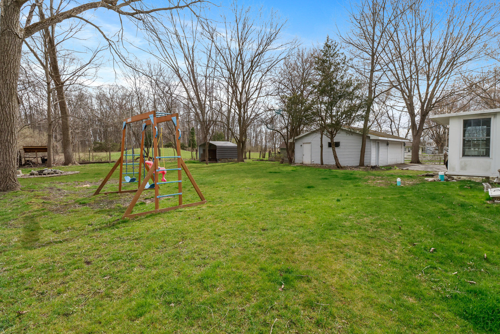 442 West Division Road Valparaiso, IN 46385 - Photo 23 of 25 a view of a backyard with a slide