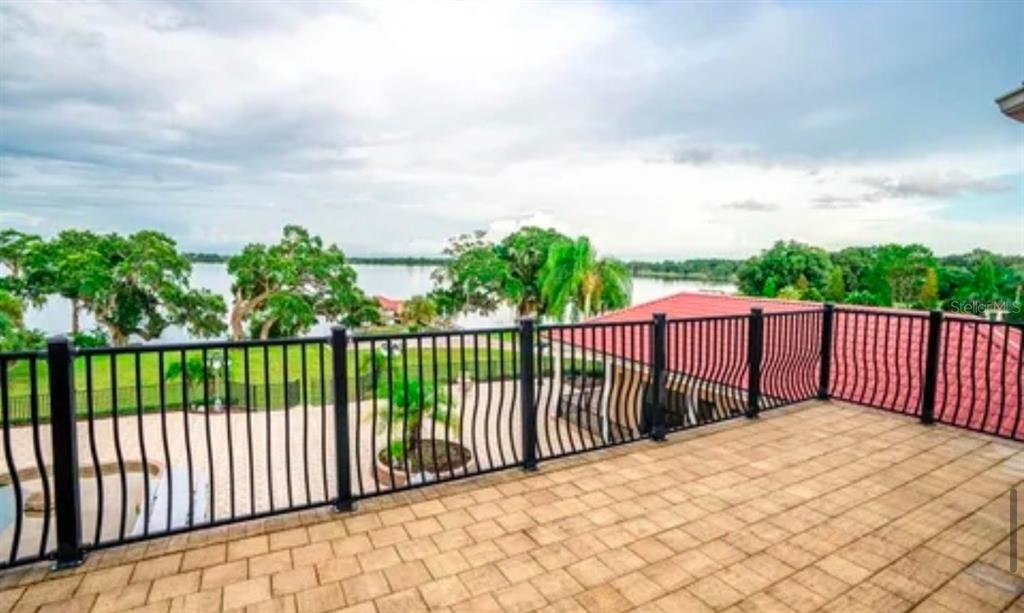 11715 Taylor Road Thonotosassa, FL 33592 - Photo 17 of 21 a balcony with trees in front of it