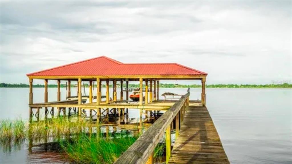 11715 Taylor Road Thonotosassa, FL 33592 - Photo 7 of 21 a view of a balcony with lake view