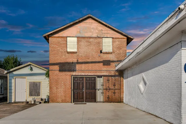 a view of a house with a garage